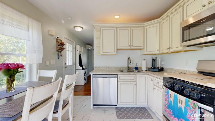Dining room, Interior, Kitchen, Recessed Lighting, Stainless Steel Appliances, Wood Texture Flooring