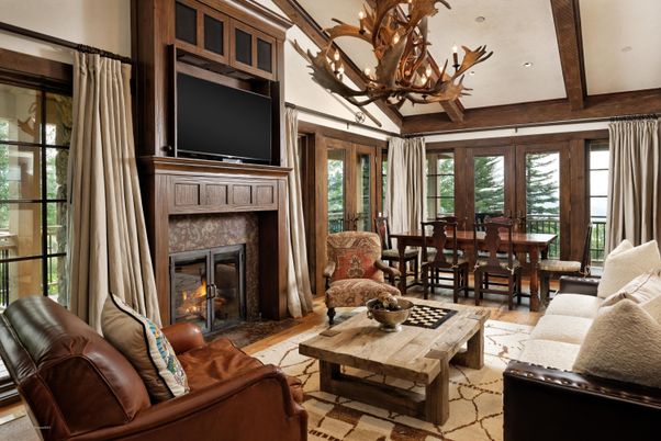 Chandelier, Dining room, Fireplace, Interior, Living room, Recessed Lighting, Wooden Beams, Wood Texture Flooring