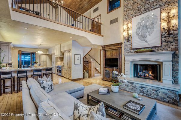 Fireplace, Interior, Kitchen, Living room, Pendant Lights, Recessed Lighting, Stone Walls, Wood Texture Flooring