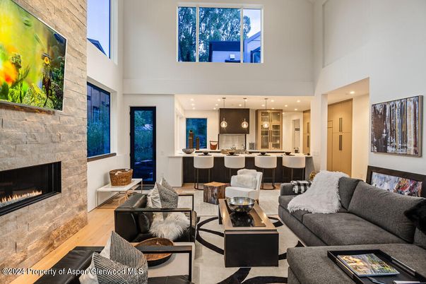 Fireplace, Interior, Kitchen, Living room, Pendant Lights, Recessed Lighting, Stone Walls, Wood Texture Flooring
