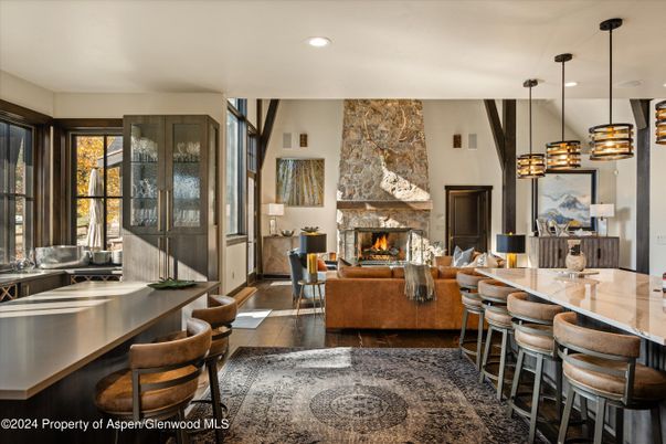 Dining room, Fireplace, Interior, Living room, Pendant Lights, Recessed Lighting, Wood Texture Flooring