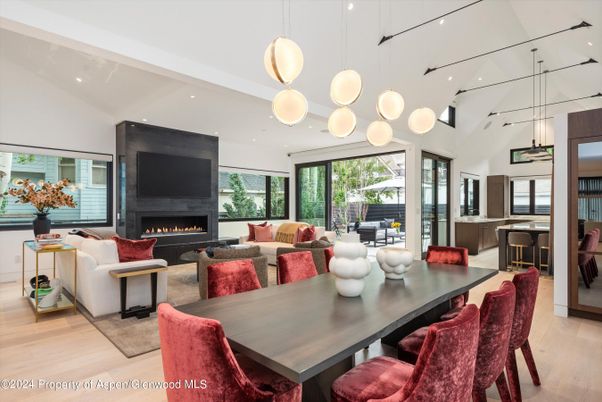 Dining room, Fireplace, Interior, Living room, Pendant Lights, Recessed Lighting, Wood Texture Flooring