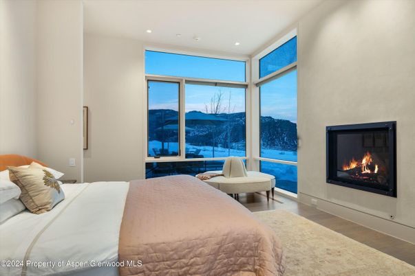 Bedroom, Fireplace, Interior, Recessed Lighting, Wood Texture Flooring