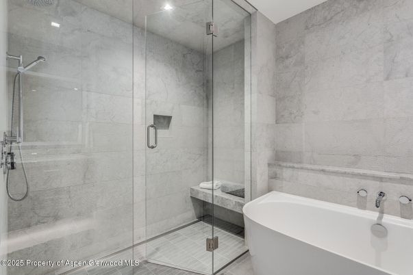 Bathroom, Free Standing Baths, Glass Shower, Interior, Marble Walls, Recessed Lighting