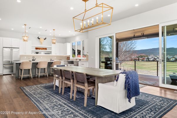 Dining room, Interior, Kitchen, Pendant Lights, Recessed Lighting, Stainless Steel Appliances, Wood Texture Flooring