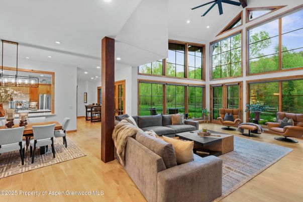 Dining room, Interior, Kitchen, Living room, Pendant Lights, Recessed Lighting, Stainless Steel Appliances, Wood Texture Flooring