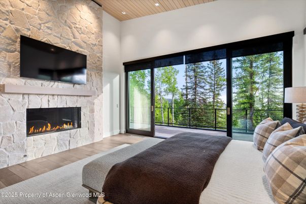 Bedroom, Fireplace, Interior, Recessed Lighting, Stone Walls, Wooden Ceilings, Wood Texture Flooring