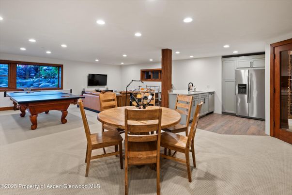 Billiard Table, Dining room, Game Room, Interior, Kitchen, Living room, Recessed Lighting, Stainless Steel Appliances, Wood Texture Flooring
