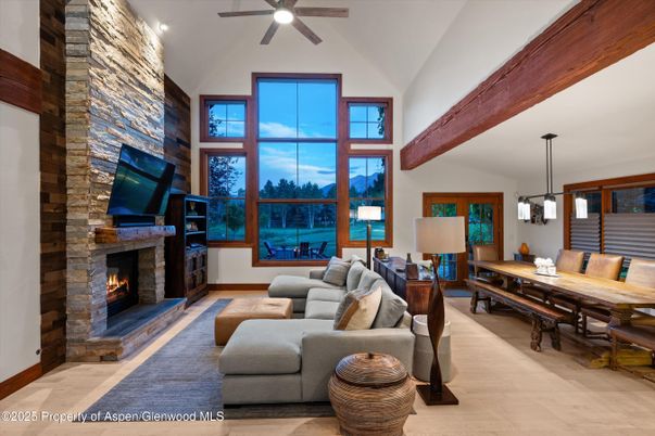Dining room, Fireplace, Interior, Living room, Pendant Lights, Stone Walls, Wood Texture Flooring