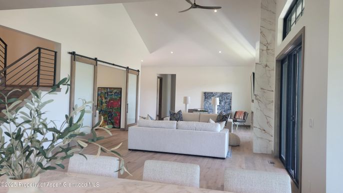 Dining room, Interior, Living room, Marble Walls, Recessed Lighting, Wood Texture Flooring