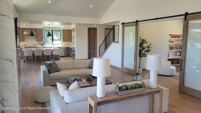 Interior, Kitchen, Living room, Marble Walls, Pendant Lights, Recessed Lighting, Stainless Steel Appliances, Wood Texture Flooring
