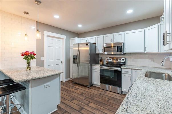 Interior, Kitchen, Pendant Lights, Recessed Lighting, Stainless Steel Appliances, Wood Texture Flooring
