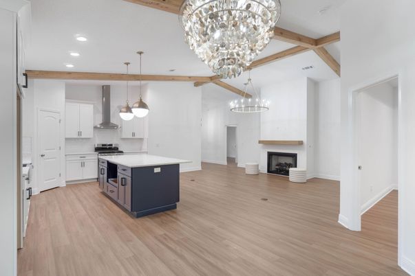 Chandelier, Fireplace, Interior, Kitchen, Pendant Lights, Recessed Lighting, Stainless Steel Appliances, Wooden Beams, Wood Texture Flooring