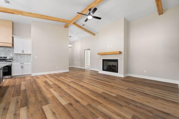 Empty room, Fireplace, Interior, Kitchen, Pendant Lights, Wooden Beams, Wood Texture Flooring