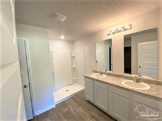 Bathroom, Dual Sink Vanities, Interior, Recessed Lighting, Wood Texture Flooring