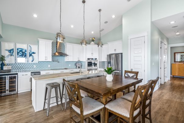 Dining room, Interior, Kitchen, Pendant Lights, Recessed Lighting, Stainless Steel Appliances, Wood Texture Flooring