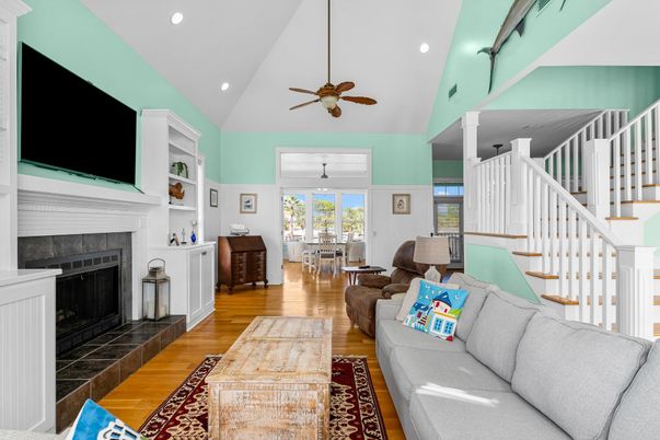 Dining room, Fireplace, Interior, Living room, Recessed Lighting, Wood Texture Flooring