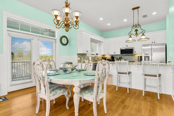 Chandelier, Dining room, Interior, Kitchen, Pendant Lights, Recessed Lighting, Stainless Steel Appliances, Wood Texture Flooring