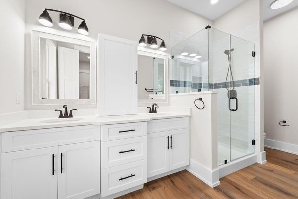 Bathroom, Dual Sink Vanities, Glass Shower, Interior, Recessed Lighting, Wood Texture Flooring