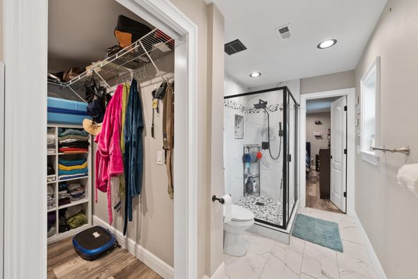 Bathroom, Glass Shower, Interior, Marble, Recessed Lighting, Walk-in Closets, Wood Texture Flooring