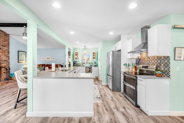 Dining room, Interior, Kitchen, Pendant Lights, Recessed Lighting, Stainless Steel Appliances, Stone Walls, Wood Texture Flooring