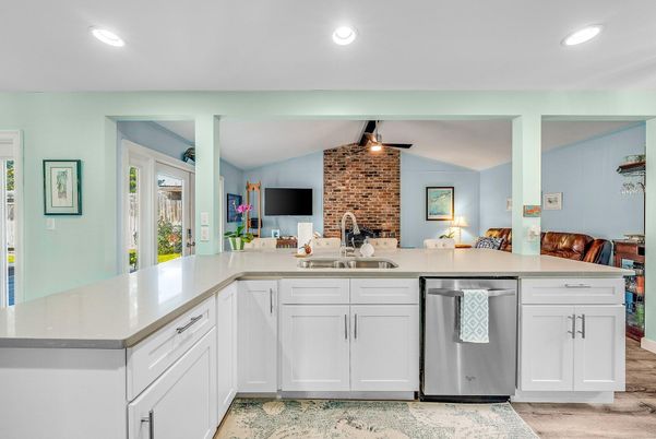 Fireplace, Interior, Kitchen, Recessed Lighting, Stainless Steel Appliances, Stone Walls, Wood Texture Flooring
