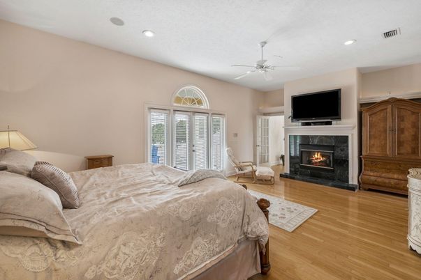 Bedroom, Fireplace, Interior, Recessed Lighting, Wood Texture Flooring