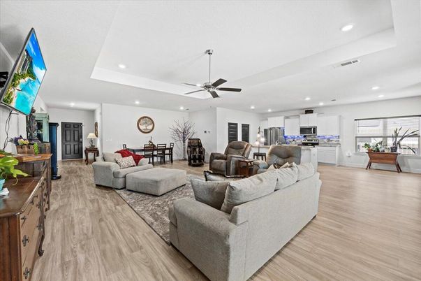 Dining room, Interior, Kitchen, Living room, Recessed Lighting, Stainless Steel Appliances, Wood Texture Flooring