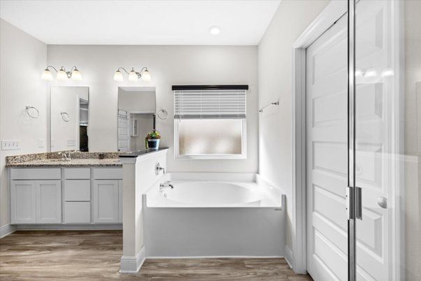 Bathroom, Dual Sink Vanities, Interior, Recessed Lighting, Wood Texture Flooring