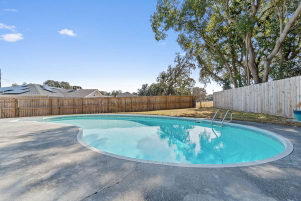 Exterior, Pool, Solar Panels