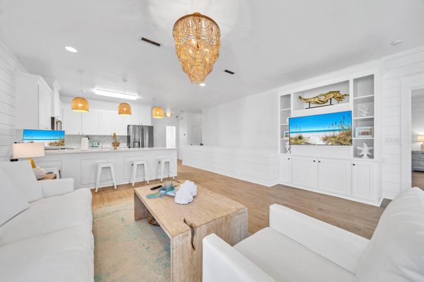 Chandelier, Interior, Kitchen, Living room, Pendant Lights, Recessed Lighting, Stainless Steel Appliances, Wood Texture Flooring