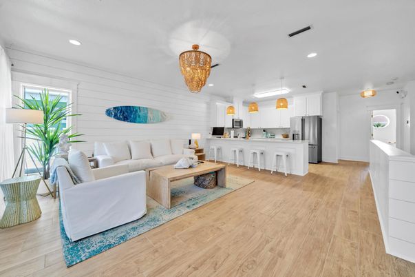 Chandelier, Interior, Kitchen, Living room, Pendant Lights, Recessed Lighting, Stainless Steel Appliances, Wood Texture Flooring