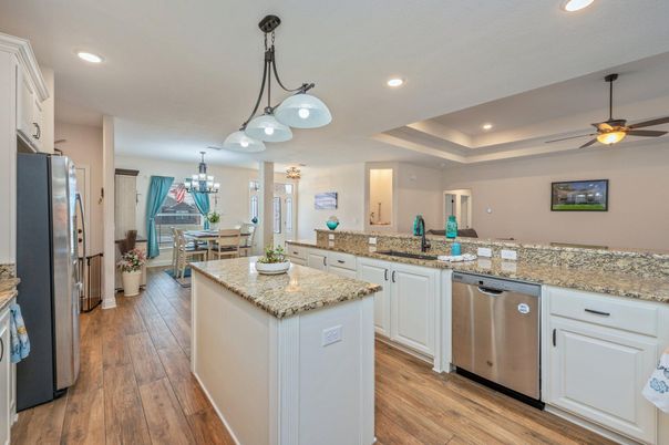 Chandelier, Dining room, Interior, Kitchen, Recessed Lighting, Stainless Steel Appliances, Wood Texture Flooring
