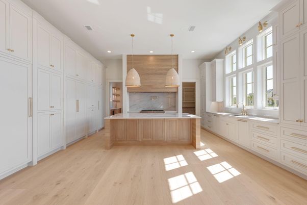 Interior, Kitchen, Marble Walls, Pendant Lights, Recessed Lighting, Stainless Steel Appliances, Wood Texture Flooring