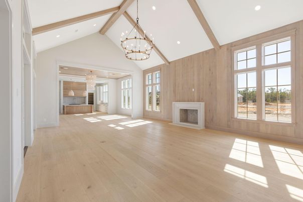 Chandelier, Empty room, Fireplace, Interior, Recessed Lighting, Wooden Beams, Wood Texture Flooring, Wooden Walls