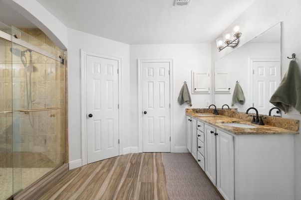 Bathroom, Dual Sink Vanities, Glass Shower, Interior, Wood Texture Flooring