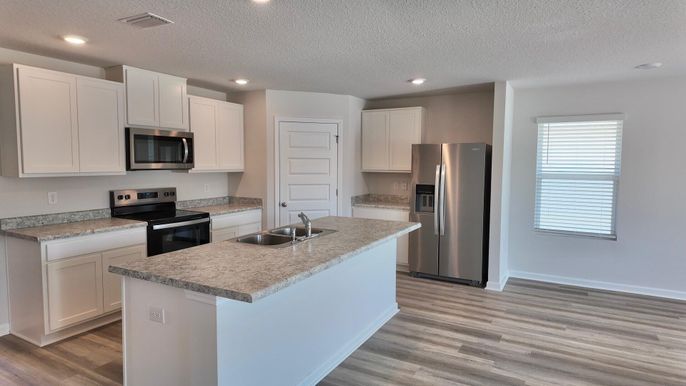 Interior, Kitchen, Recessed Lighting, Stainless Steel Appliances, Wood Texture Flooring
