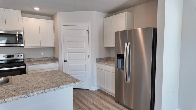 Interior, Kitchen, Recessed Lighting, Stainless Steel Appliances, Wood Texture Flooring