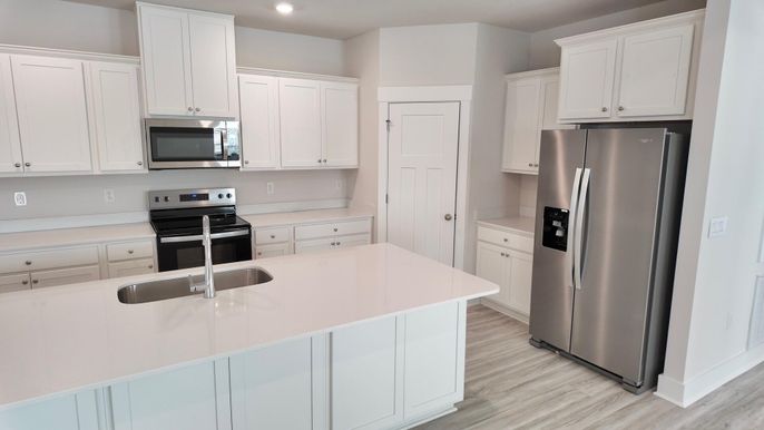 Interior, Kitchen, Recessed Lighting, Stainless Steel Appliances, Wood Texture Flooring