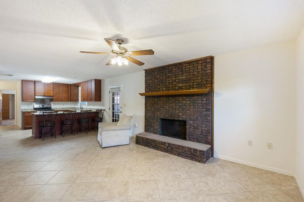 Fireplace, Interior, Kitchen, Stainless Steel Appliances, Stone Walls