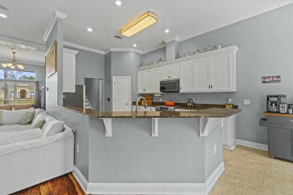 Chandelier, Interior, Kitchen, Recessed Lighting, Stainless Steel Appliances, Wood Texture Flooring
