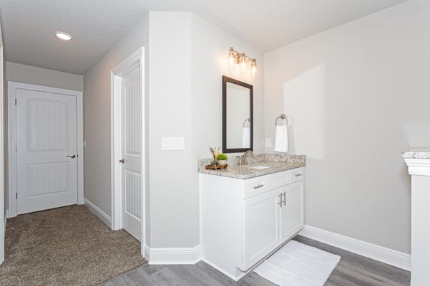 Bathroom, Dual Sink Vanities, Interior, Recessed Lighting, Wood Texture Flooring