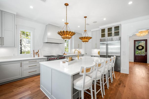 Interior, Kitchen, Marble Walls, Pendant Lights, Recessed Lighting, Stainless Steel Appliances, Wood Texture Flooring