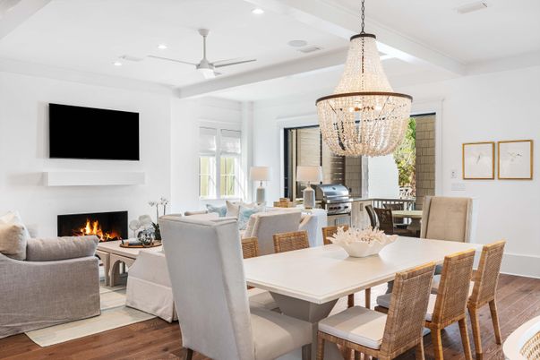 Chandelier, Dining room, Fireplace, Interior, Living room, Pendant Lights, Recessed Lighting, Wood Texture Flooring