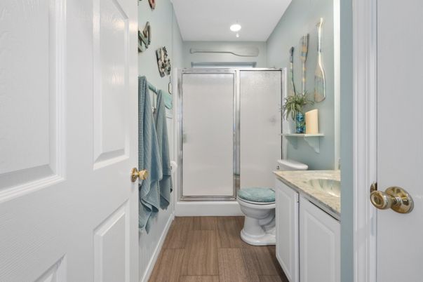 Bathroom, Glass Shower, Interior, Recessed Lighting, Wood Texture Flooring