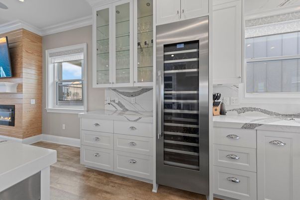 Fireplace, Interior, Kitchen, Recessed Lighting, Stainless Steel Appliances, Wood Texture Flooring