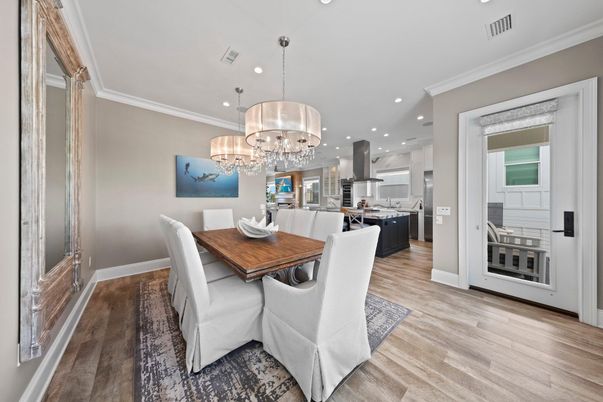 Chandelier, Dining room, Interior, Kitchen, Pendant Lights, Recessed Lighting, Stainless Steel Appliances, Wood Texture Flooring