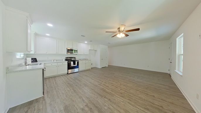 Interior, Kitchen, Recessed Lighting, Stainless Steel Appliances, Wood Texture Flooring