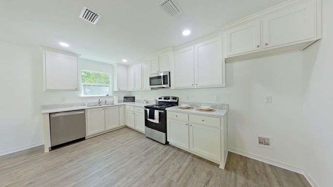 Interior, Kitchen, Recessed Lighting, Stainless Steel Appliances, Wood Texture Flooring