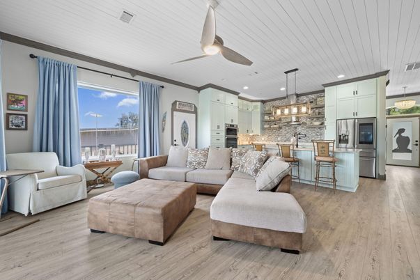 Chandelier, Dining room, Interior, Kitchen, Living room, Pendant Lights, Recessed Lighting, Stainless Steel Appliances, Wood Texture Flooring